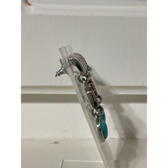 silver-toned dangle drop earrings featuring a red cross and a turquoise heart in - Picture 2 of 3